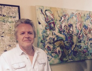 Stephen Beveridge with his painting "Hans and Dieter go fishing", at University of California Riverside Palm Desert in conjunction with the Palm Springs Art Museum Arist Council